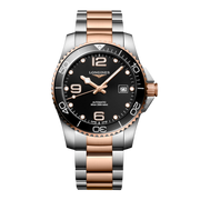 Quadrante nero a raggi di sole con numeri arabi e indici applicati, lancette rosa con trattamento Swiss Super-LumiNova® dell'orologio Longines HydroConquest automatico